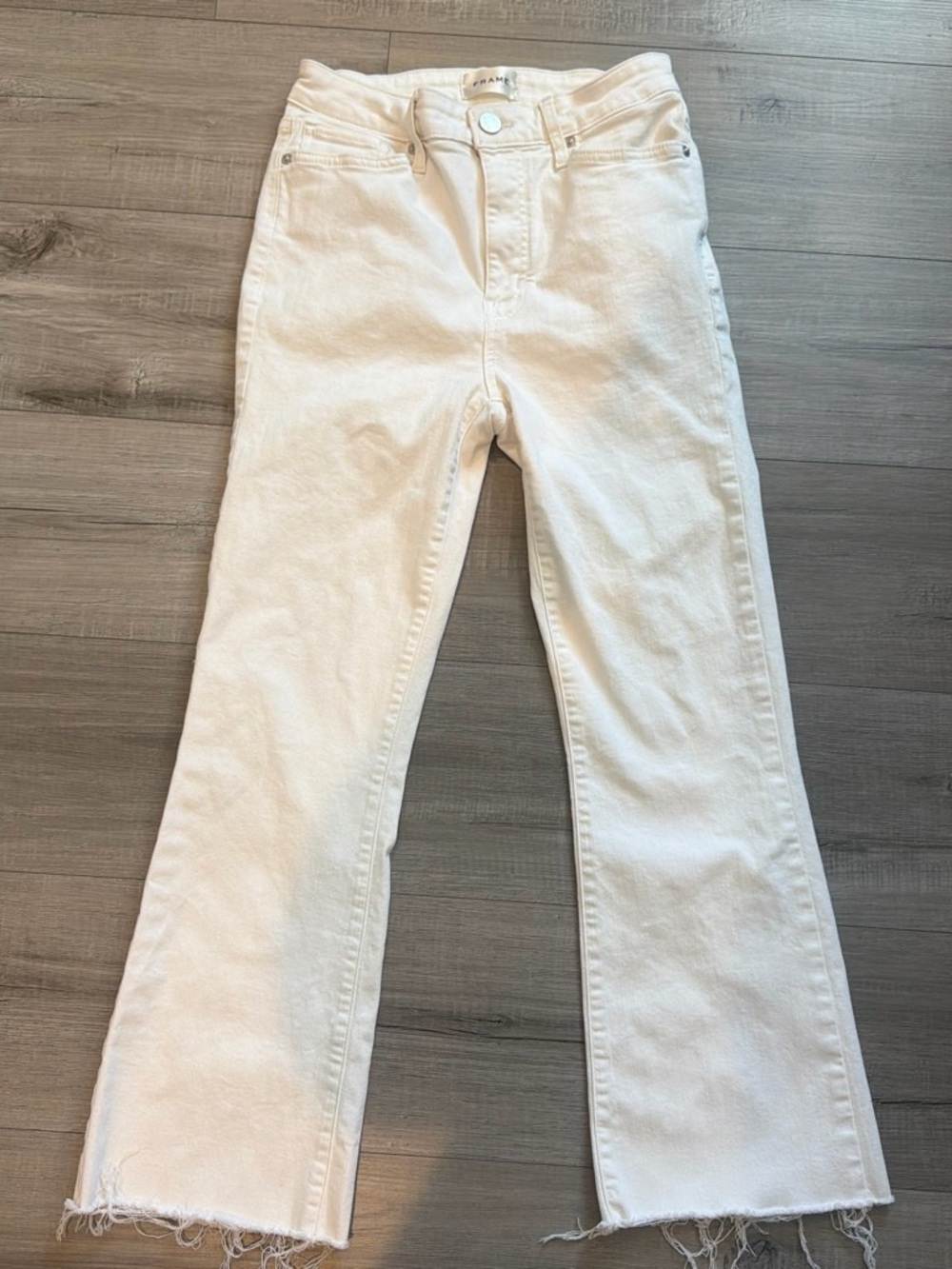Frame Denim White Flared Jeans with Raw Hem